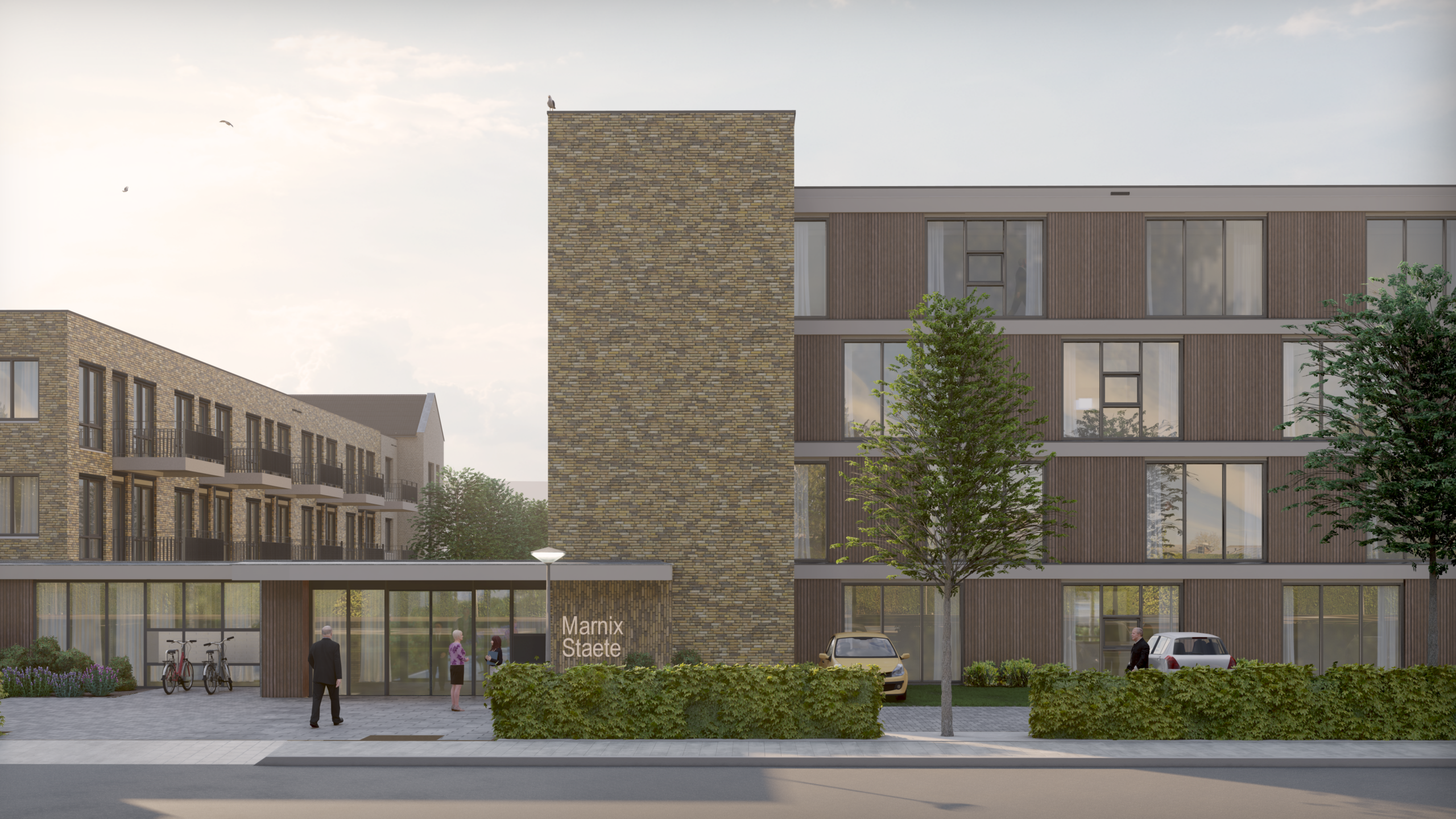 Afbeelding van de entree van een modern gebouw met bakstenen en glas, omgeven door bomen en geparkeerde auto's op de voorgrond.