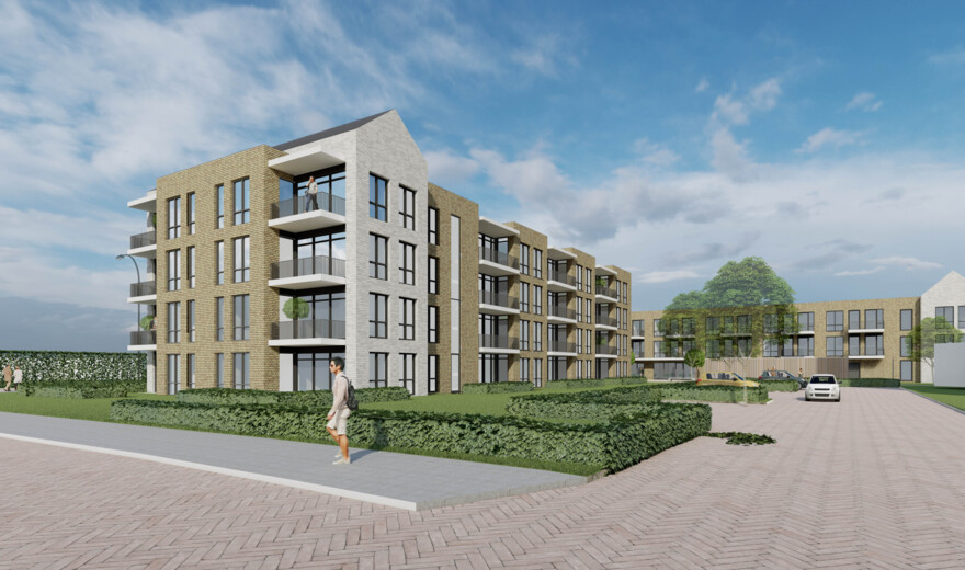Afbeelding van een modern appartementencomplex met meerdere verdiepingen, omgeven door groen en een heldere blauwe lucht.