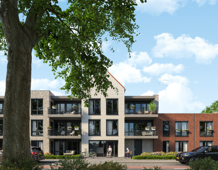 Moderne appartementencomplex met drie verdiepingen, omgeven door groen. Een grote boom staat links op de voorgrond.