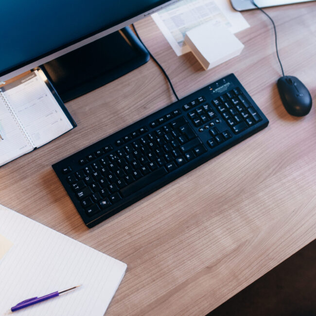 Computer met notitieblok