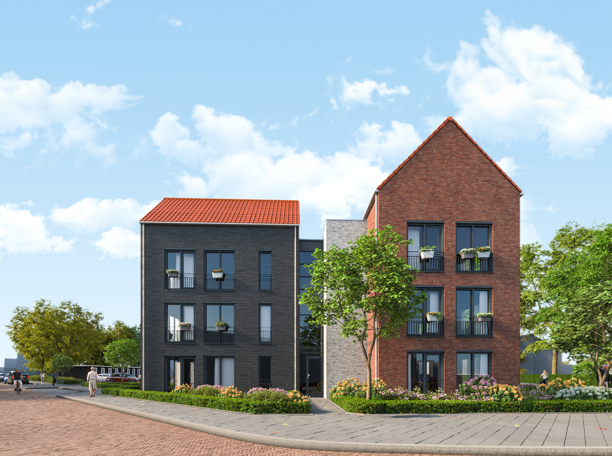 Een buitenaanzicht van Oester Staete. Er zijn 2 gevels te zien. Eén met een donkere en andere met een bruine steen. Beide gevels hebben een puntdak.