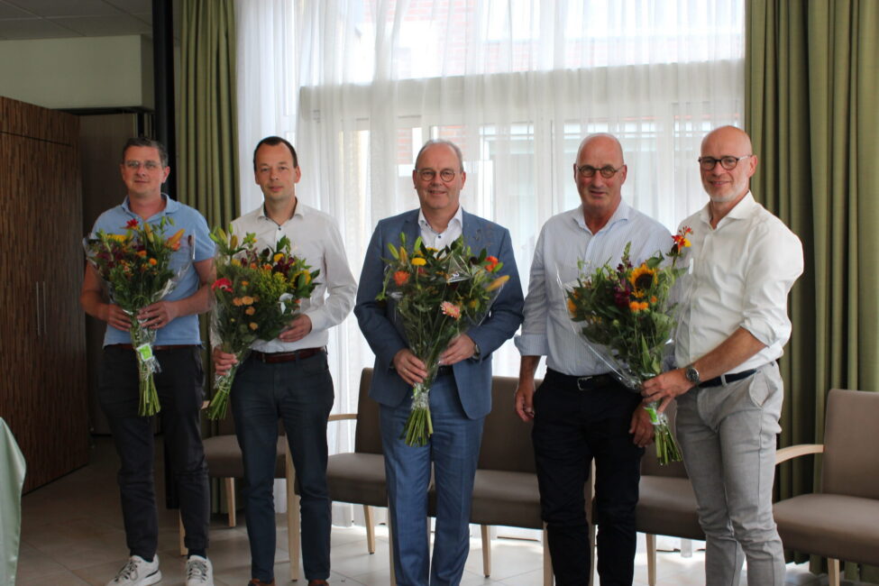 Het team met bloemen